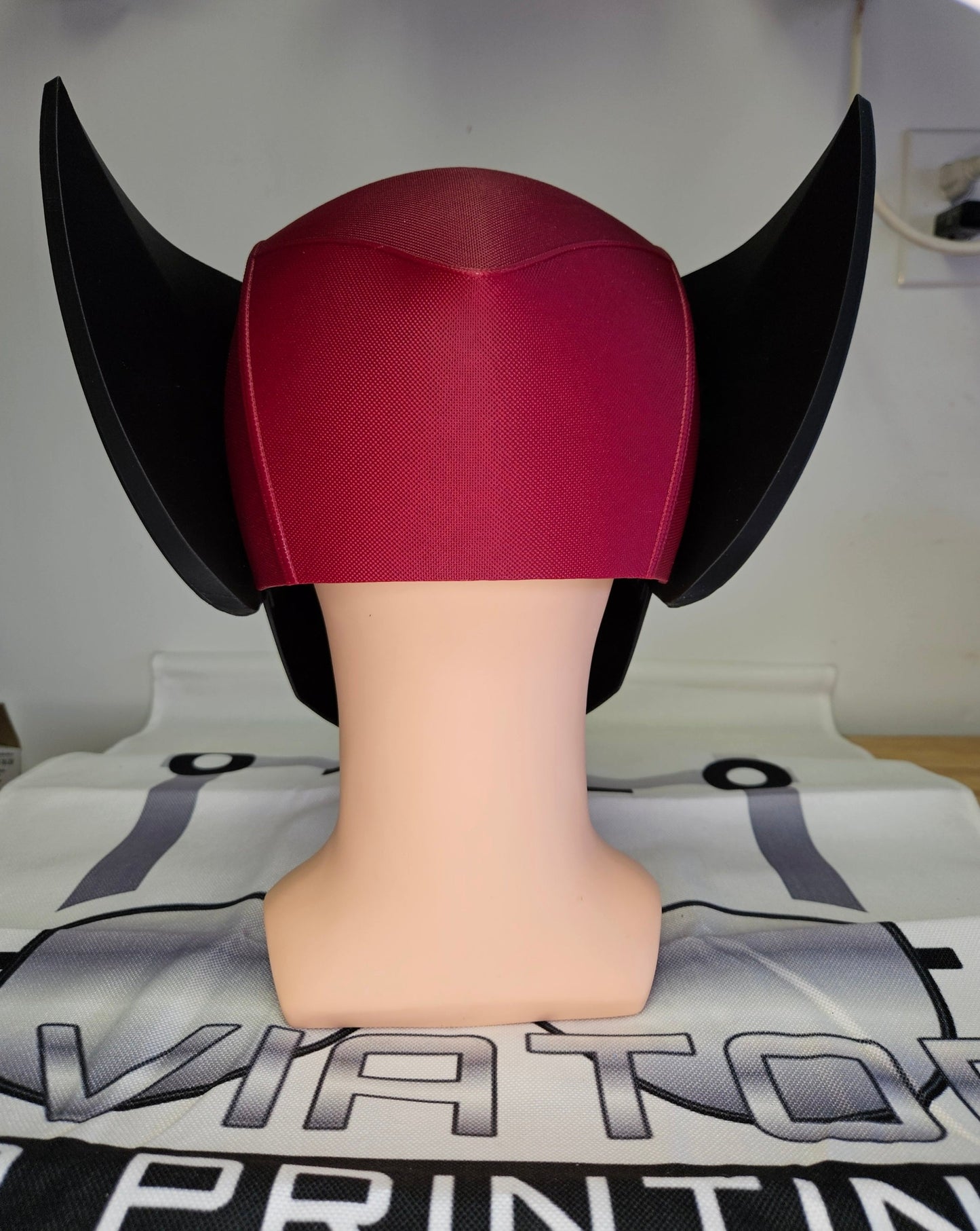 Deadpool and Wolverine mash up helmet. 3D Printed Poolverine cosplay prop by Aviator 3D Printing. Treat yourself or gift to a special person. Great for home office display, or to wear anytime. Get yours before the next Marvel Deadpool and Wolverine movie.
