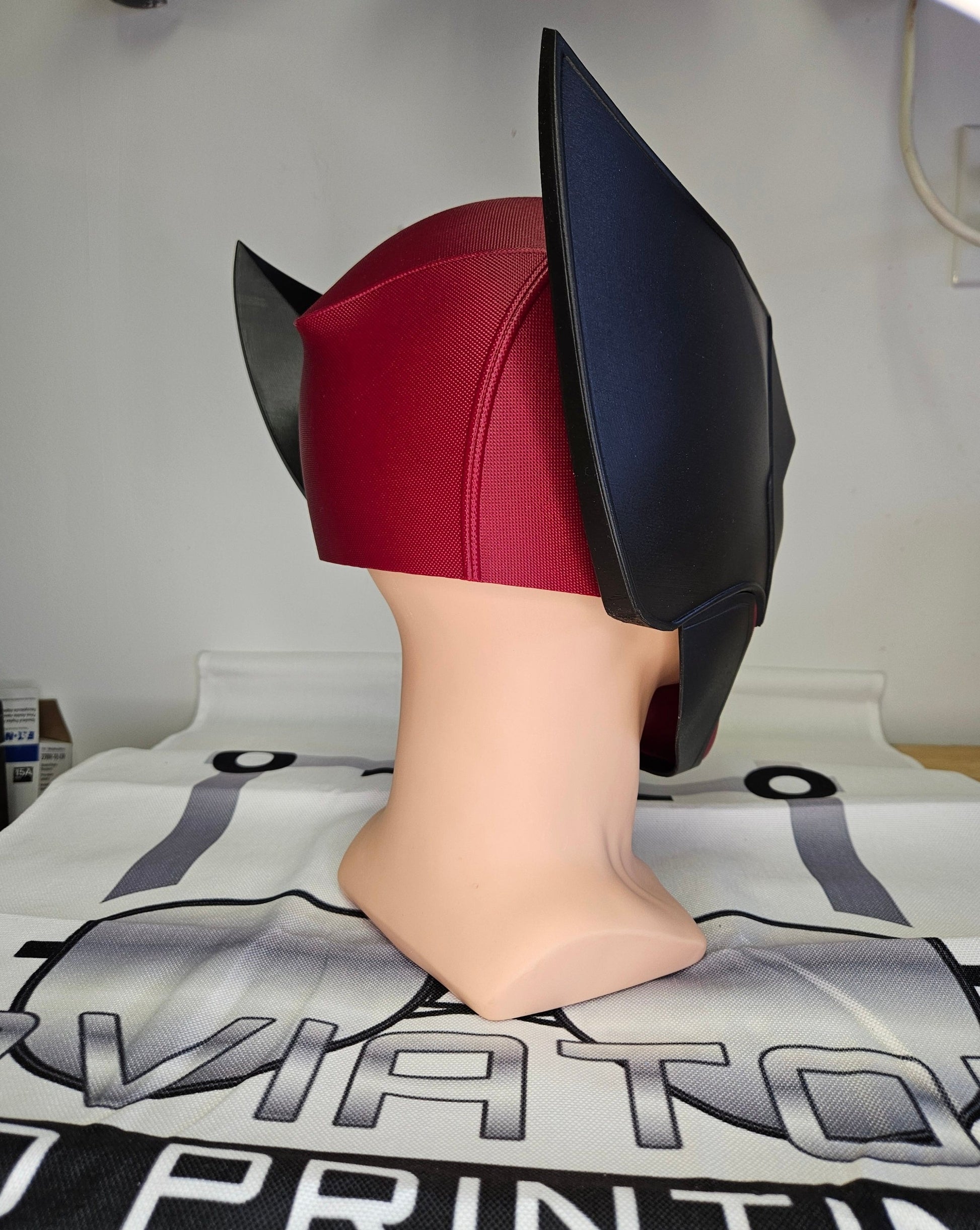 Deadpool and Wolverine mash up helmet. 3D Printed Poolverine cosplay prop by Aviator 3D Printing. Treat yourself or gift to a special person. Great for home office display, or to wear anytime. Get yours before the next Marvel Deadpool and Wolverine movie.