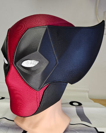 Deadpool and Wolverine mash up helmet. 3D Printed Poolverine cosplay prop by Aviator 3D Printing. Treat yourself or gift to a special person. Great for home office display, or to wear anytime. Get yours before the next Marvel Deadpool and Wolverine movie.