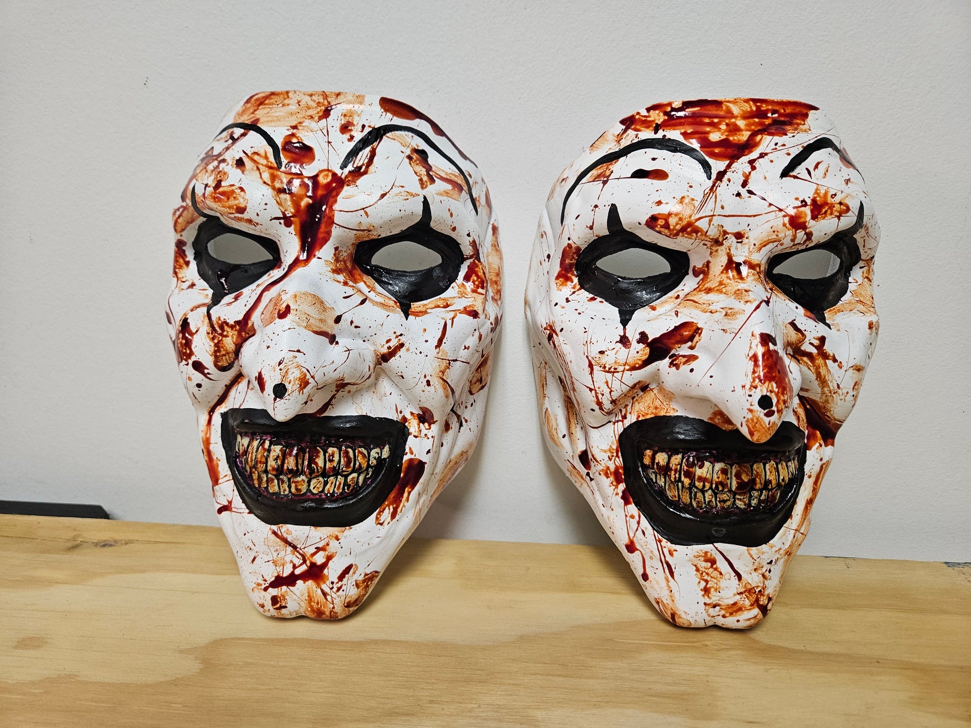 Art the clown from the Terrifier movie mask is 3D printed, painted and accented in realistic FAKE blood paint or without. Available now from Aviator 3D Printing .com